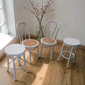 White Bentwood Chairs With Stools