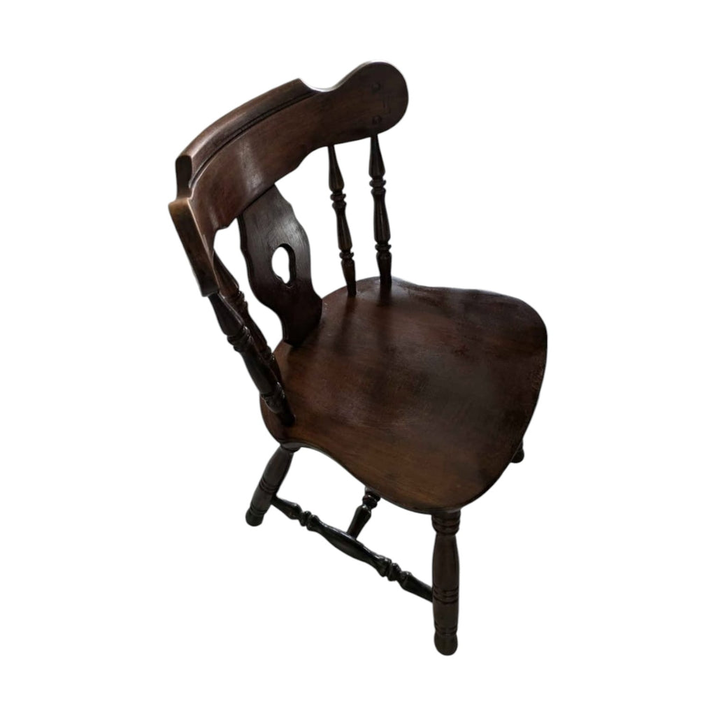 Dark Wood Oval Dining Table With Six Traditional Windsor-Style Wooden Chairs