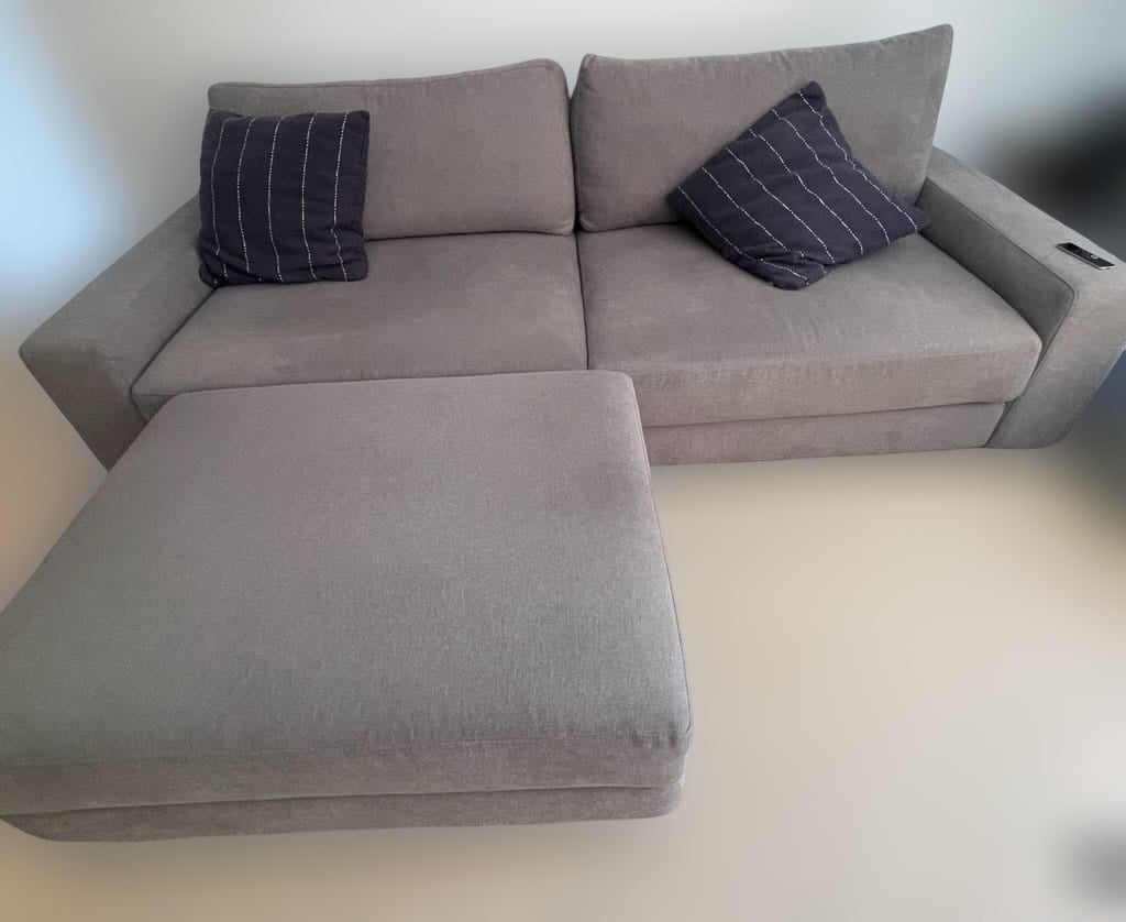 King Living Grey Fabric Modular Sofa With An Ottoman
