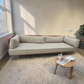 Modern Scandinavian Style Sofa Bed With A Light Wood Frame And Grey Upholstered Cushions X2 ($1300 Each)