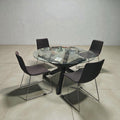 Round Glass Dining Table With Timber Leg & X4 Black Chairs (Dimensions: 75x140)