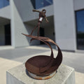 Stick Figure Sculpture Of A Surfer Riding A Curved Wave (Dimensions: 48cm)