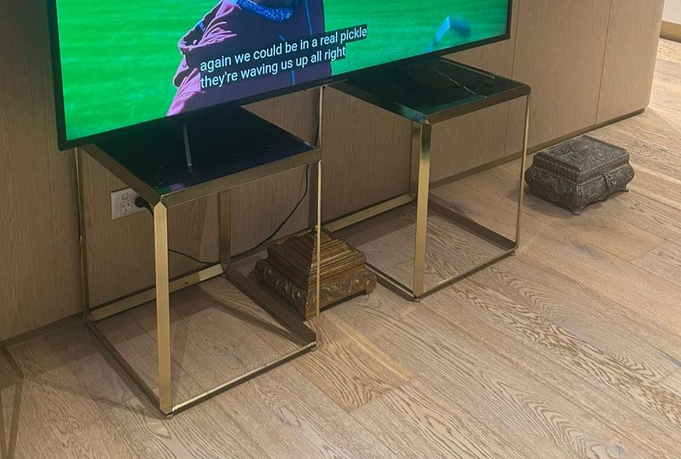 Add a Touch of Glamour with These Stunning Black and Gold Accent Tables