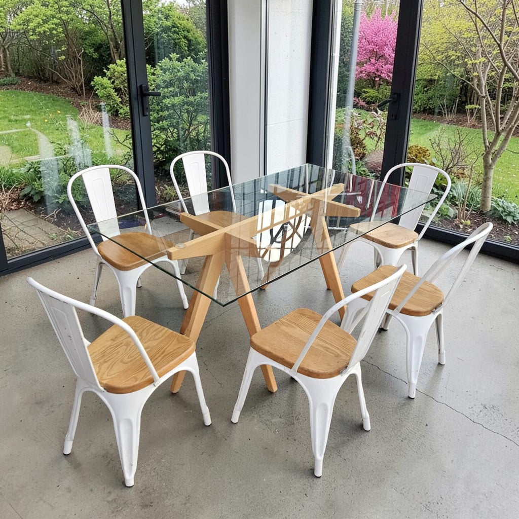 Wooden Table With A Glass Top Paired With Six White Metal And Wood Dining Chairs